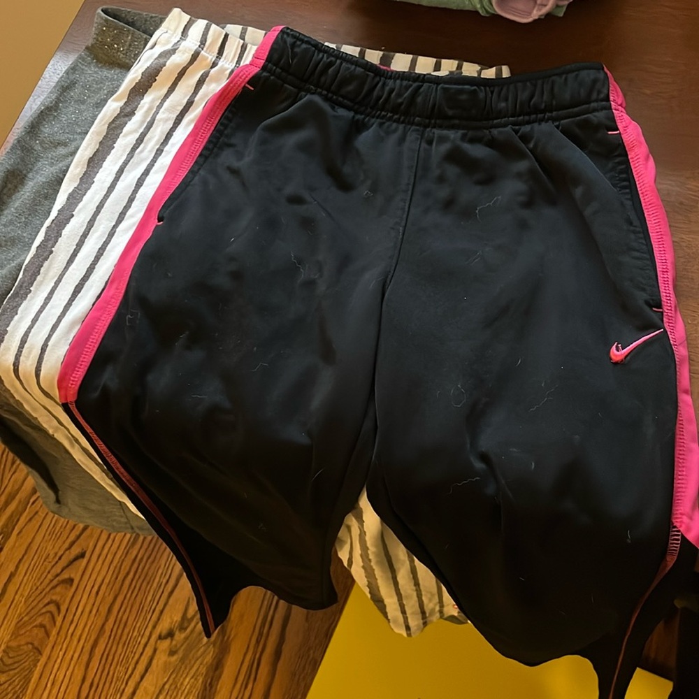 Three pair girls size 10 pants, including Nike